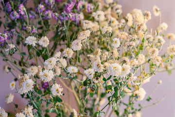 Withered bouquet of flowers. Shallow depth of field.