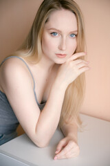 Obraz premium Portrait of a beautiful young woman with blue eyes.