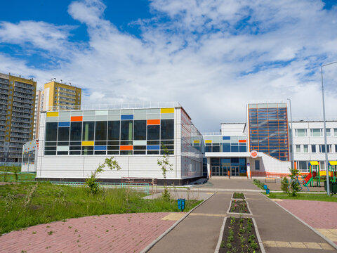 Krasnoyarsk. Russia - July 1, 2021: New school in the Solnechny microdistrict. Summer sunny day