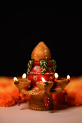Traditional oil lamps with flower decoration for indian festival diwali.