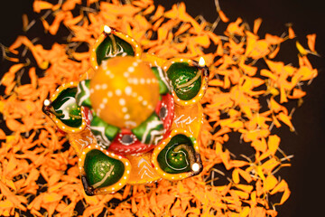 Traditional oil lamps with flower decoration for indian festival diwali.