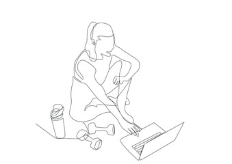 Fototapeta na wymiar woman exercising and doing sports looking at laptop at home