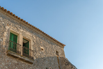 Monti-sion Monastery at sunset. Detail of the architecture and the surrounding nature. Island of Mallorca, Spain
