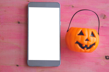 phone with pumpkin and background happy Halloween