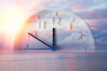 Beautiful lilac sky, ocean and close up of clock. Double exposure. Copy space. Concept of Daylight...