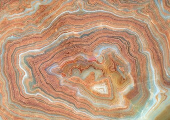 Onyx marble stone , crossed cut. Main color is brown with adds of green,white and red. Texture and...