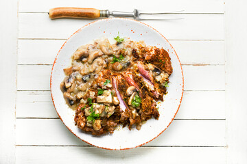 Turkey schnitzel with fried mushrooms
