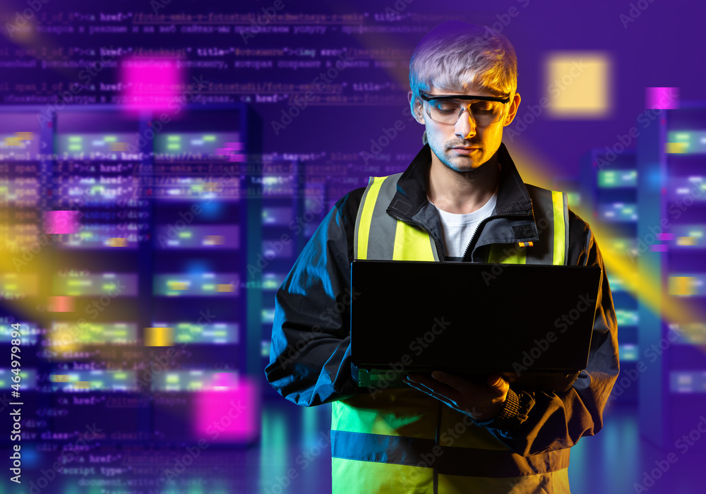 Poster system administrator. technical controller of server equipment. technical administrator with laptop.