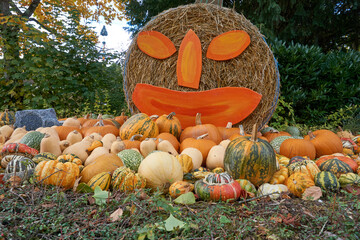 deco artwork with pumpkins and figures in halloween style