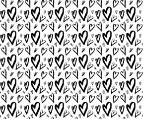 Seamless hand drawn pattern with different hearts. Abstract childish texture for fabric, textile, apparel. Vector illustration
