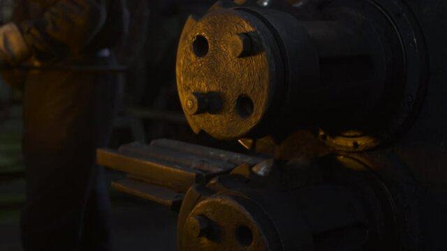 At a steel mill, various parts are smelted from red-hot iron