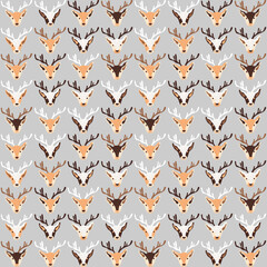 Christmas pattern with heads of reindeers on grey background. Vector illustration 