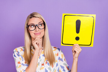 Photo of dreamy funny mature lady dressed print blouse glasses looking holding alert card smiling...