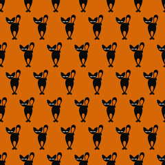 Vector seamless pattern with black cfts. Creative design with black cats on the orange background. Vector illustration. Textile pattern, print pattern