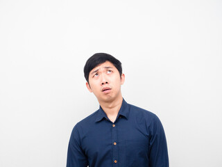 Man feeling worried emotion looking up at copy space