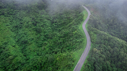 Road no.3 or sky road on Root 1081 over top of mountains with green jungle in Santisuk - Bo Kluea District, Nan province, Thailand.