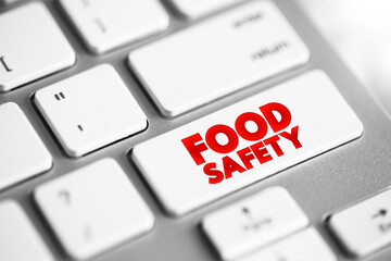 Food Safety text button on keyboard, concept background