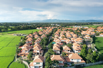 Housing estate in aerial view. That village or community consist of residential building in land...