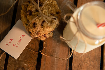 cookies and milk for santa claus, christmas concept, seasonal celebration, new year eve, xmas evening, festive family tradition. 
