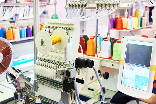 Industrial embroidery machines in sewing workshop