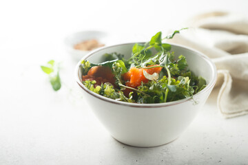 Healthy green salad with smoked salmon