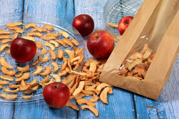 Dried apples slices. Dried Apples Slice. Grid for home drying of fruits and vegetables with dried apples slice. dehydrated fruits
