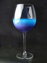 blue drinks, glass with drink, blue drink with gradient, glass on black background