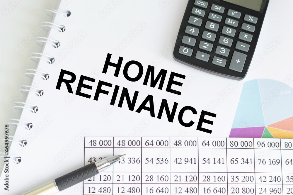 Poster a business card with text home refinance lying on the background of reports on the table. business c