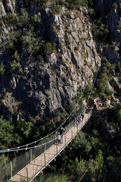 CHULILLA, SPAIN, OCTOBER - 2021: People at the Chulilla suspension bridges route
