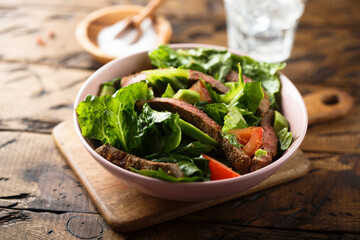 Beef steak salad with tomatoes and avocado