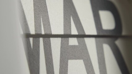 Close-up shot of Months on flip calendar clock