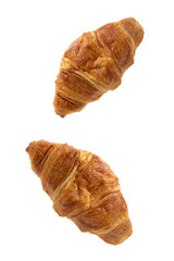 Two  one fresh juicy croissants with cheese, jam, cream on puff pastry without filling with crumbs on a white background close macro