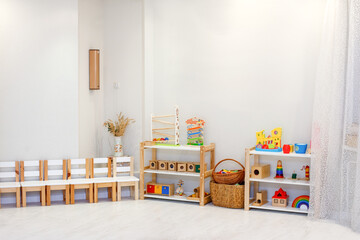 Montessori material, Kindergarten Preschool Classroom Interior, wooden furniture and toys, didactic materials - obrazy, fototapety, plakaty