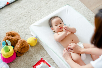 Baby having a change of diaper