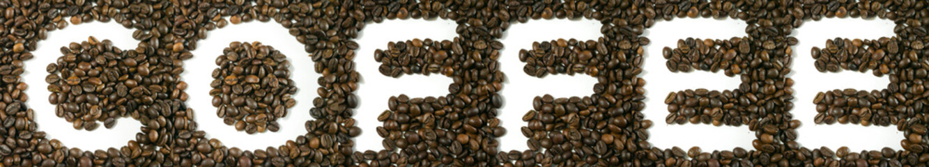 Coffee beans making the word letters, coffee, white background