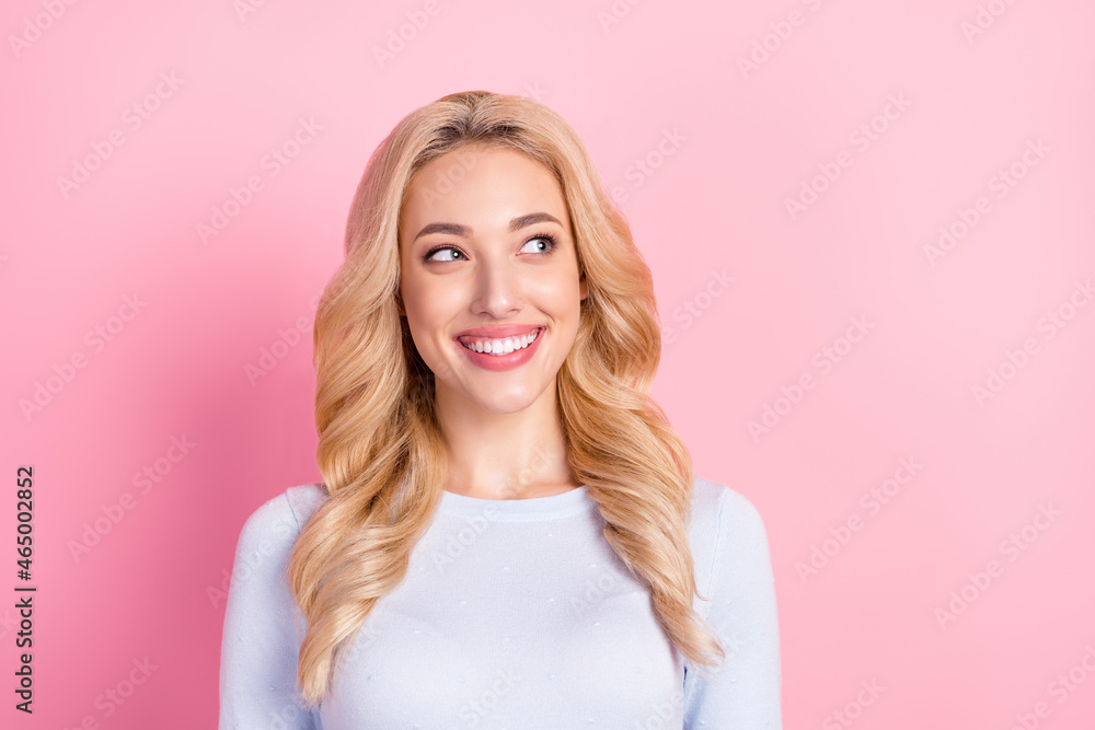 Sticker Photo of positive happy pretty young woman look empty space good mood dream isolated on pink color background