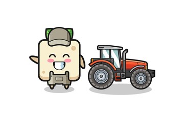 the tofu farmer mascot standing beside a tractor