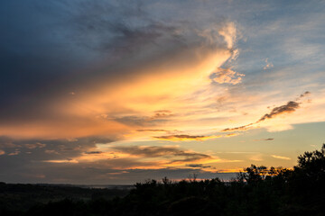 Fototapeta na wymiar Beautiful sunset above the field. Landscape