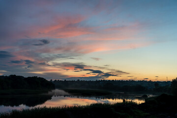 Fototapeta na wymiar Beautiful sunset above the lake. Landscape