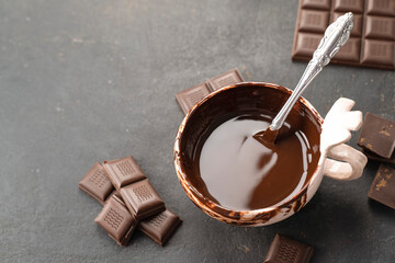 Chocolatier cover melted chocolate tower pieces chocolates with mint. recipe Cooking handmade chocolate bar, dessert, candies. Confectionery covered with chocolate topping with mints leaf