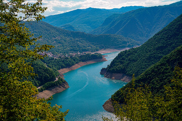 Fototapeta na wymiar Piva river flows through the mountains, photo in vertical position