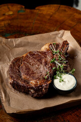 Butchery advertisement, roasted veal steak on brown paper