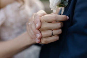 Just married couple showing up their rings