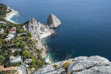 Aerial view of beautiful landscape of Simeiz village from cat mountain. Diva and Penea rocks in background. Crimea