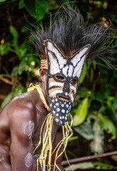Warrior of the Asmat tribe in a combat mask.