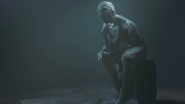 Thinking man, thinker statue. Realistic animation. Close up. Zoom in. 4k.