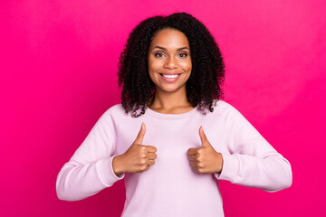 Photo of cool millennial brunette lady thumb up wear pink sweater isolated on magenta color background