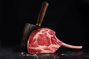Fotobehang Fresh tomahawk steak on old board © nerudol