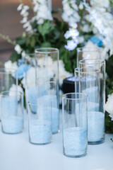 Wedding decor. Elegant table setup in blue pastels.
