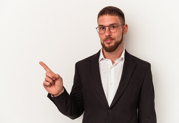 Young business caucasian man isolated on white background smiling and pointing aside, showing something at blank space.